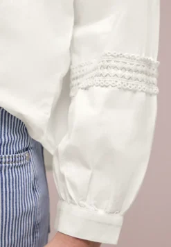 Blouse à manches longues avec détails en croquet