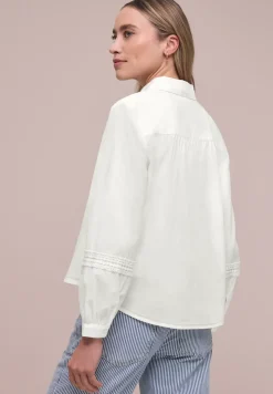 Blouse à manches longues avec détails en croquet