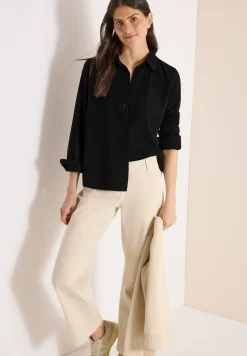 Blouse à manches longues avec structure et boutons