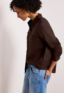 Blouse à manches longues avec poches sur la poitrine