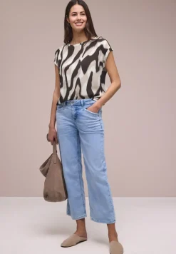 Blouse à épaules tombantes avec bandes décoratifves