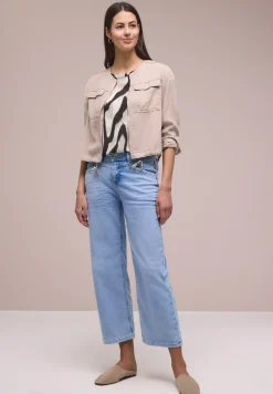 Blouse à épaules tombantes avec bandes décoratifves