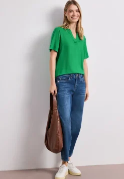 Blouse à épaules tombantes avec col fendu