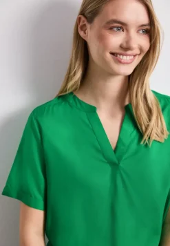 Blouse à épaules tombantes avec col fendu