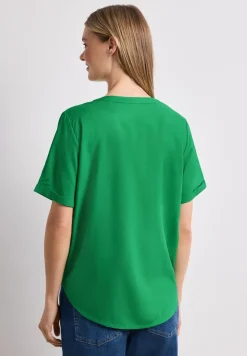 Blouse à épaules tombantes avec col fendu