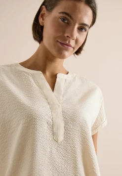 Blouse à épaules tombantes en seersucker