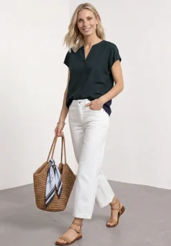 Blouse à épaules tombantes avec col fendu