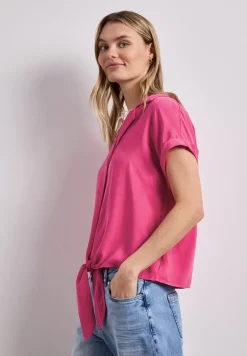 Blouse à épaules tombantes avec col bowling