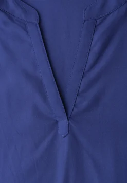 Blouse à épaules tombantes avec col fendu