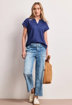 Blouse à épaules tombantes avec col fendu