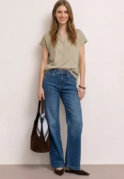 Blouse à épaules tombantes avec col fendu