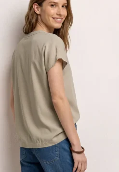 Blouse à épaules tombantes avec col fendu
