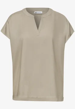 Blouse à épaules tombantes avec col fendu