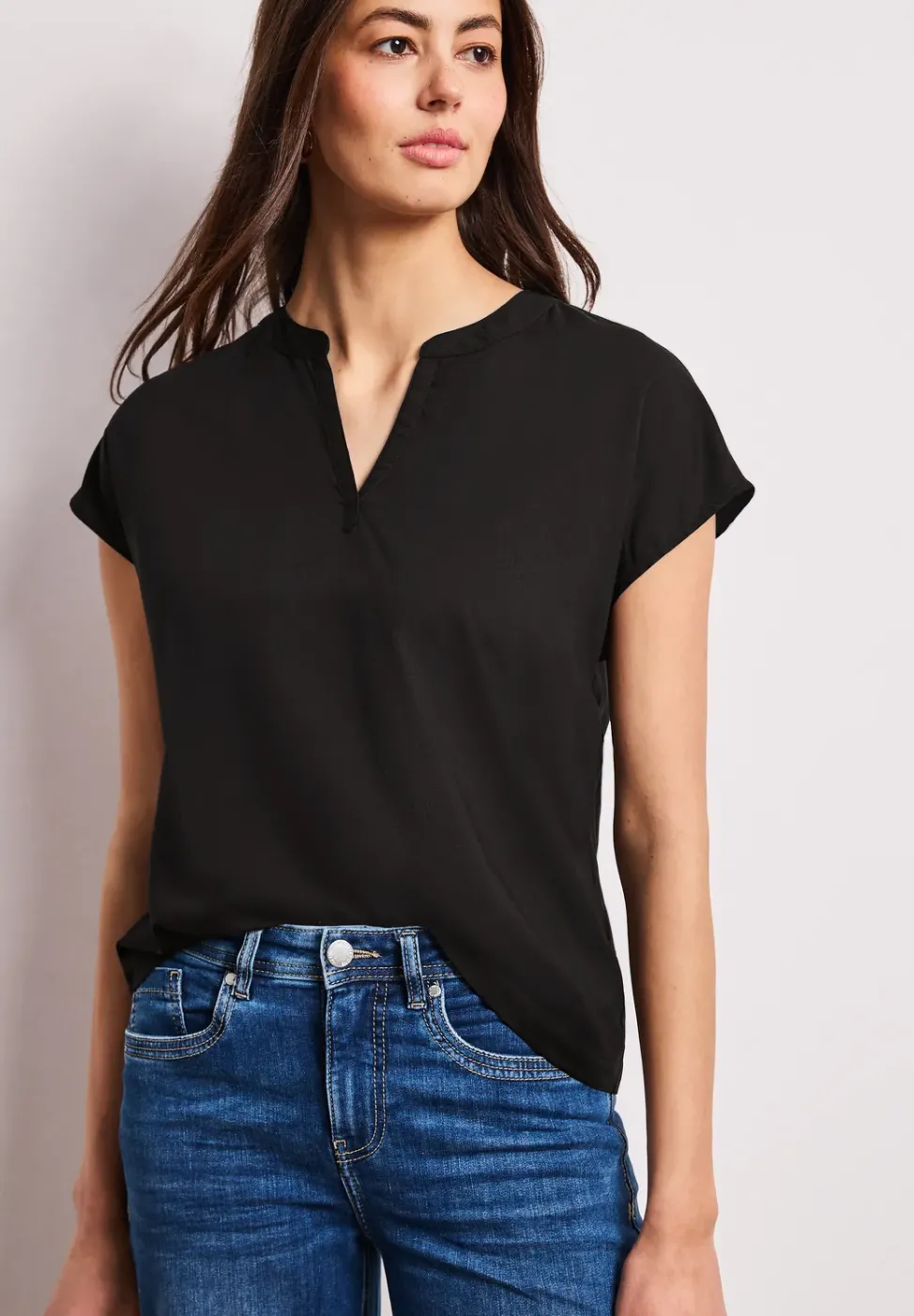 Blouse à épaules tombantes avec col fendu