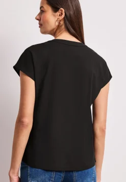 Blouse à épaules tombantes avec col fendu