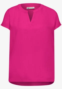 Blouse à épaules tombantes avec col fendu