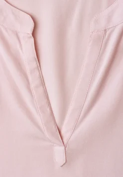 Blouse à épaules tombantes avec col fendu