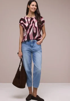 Blouse à épaules tombantes avec bandes décoratifves
