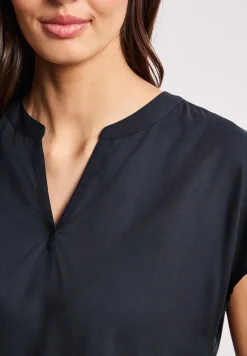 Blouse à épaules tombantes avec col fendu