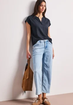 Blouse à épaules tombantes avec col fendu