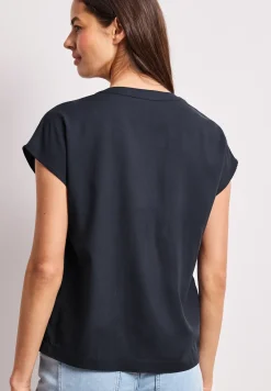 Blouse à épaules tombantes avec col fendu