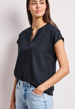 Blouse à épaules tombantes avec col fendu