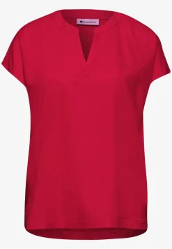Blouse à épaules tombantes avec col fendu