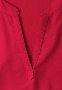 Blouse à épaules tombantes avec col fendu