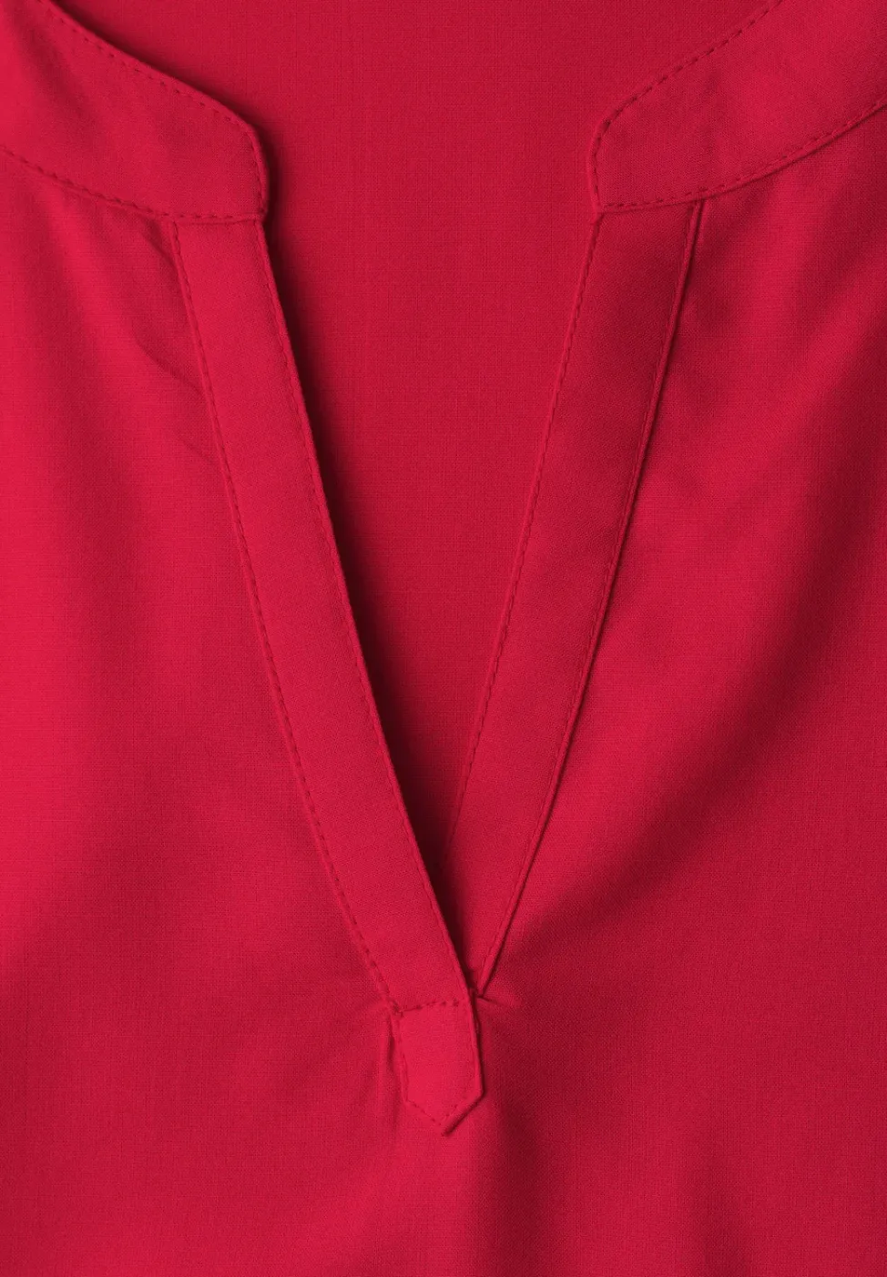 Blouse à épaules tombantes avec col fendu