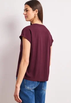 Blouse à épaules tombantes avec col fendu