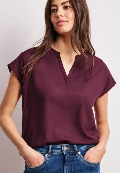 Blouse à épaules tombantes avec col fendu
