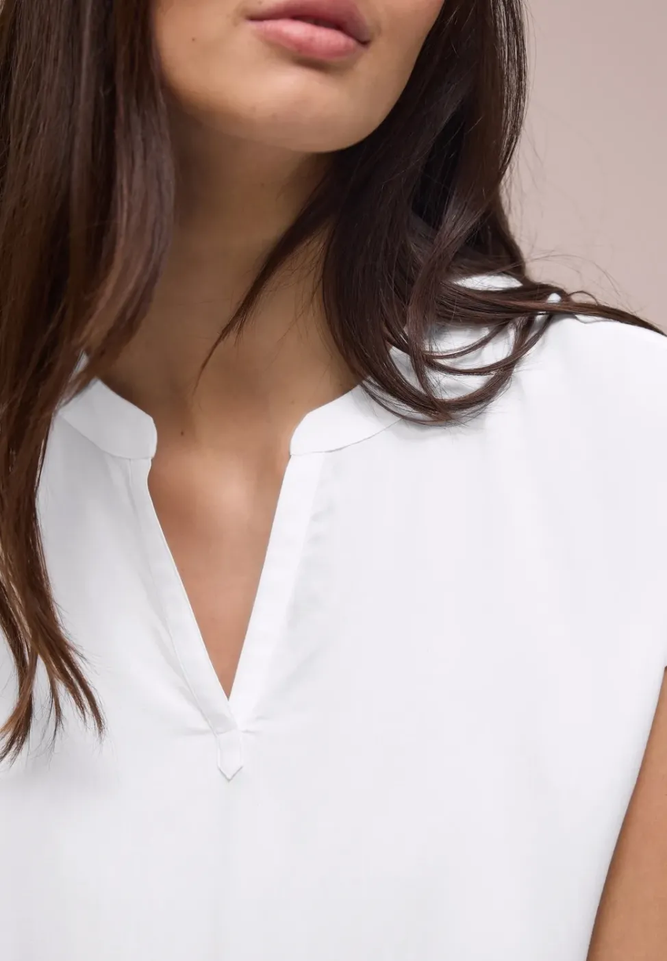 Blouse à épaules tombantes avec col fendu