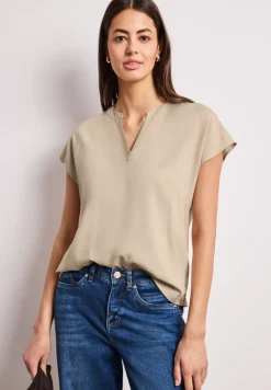 Blouse à épaules tombantes avec col fendu
