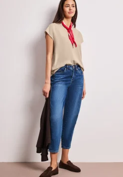 Blouse à épaules tombantes avec col fendu