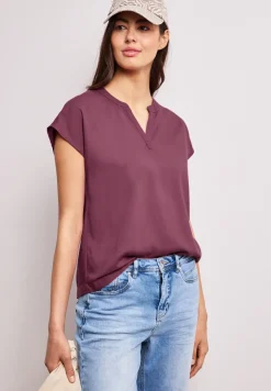 Blouse à épaules tombantes avec col fendu