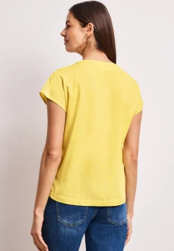 Blouse à épaules tombantes avec col fendu