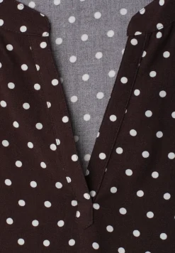 Blouse à épaules tombantes avec col fendu