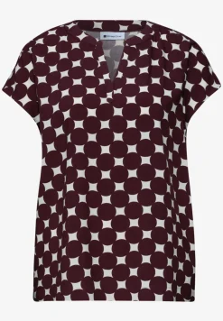 Blouse à épaules tombantes avec col fendu