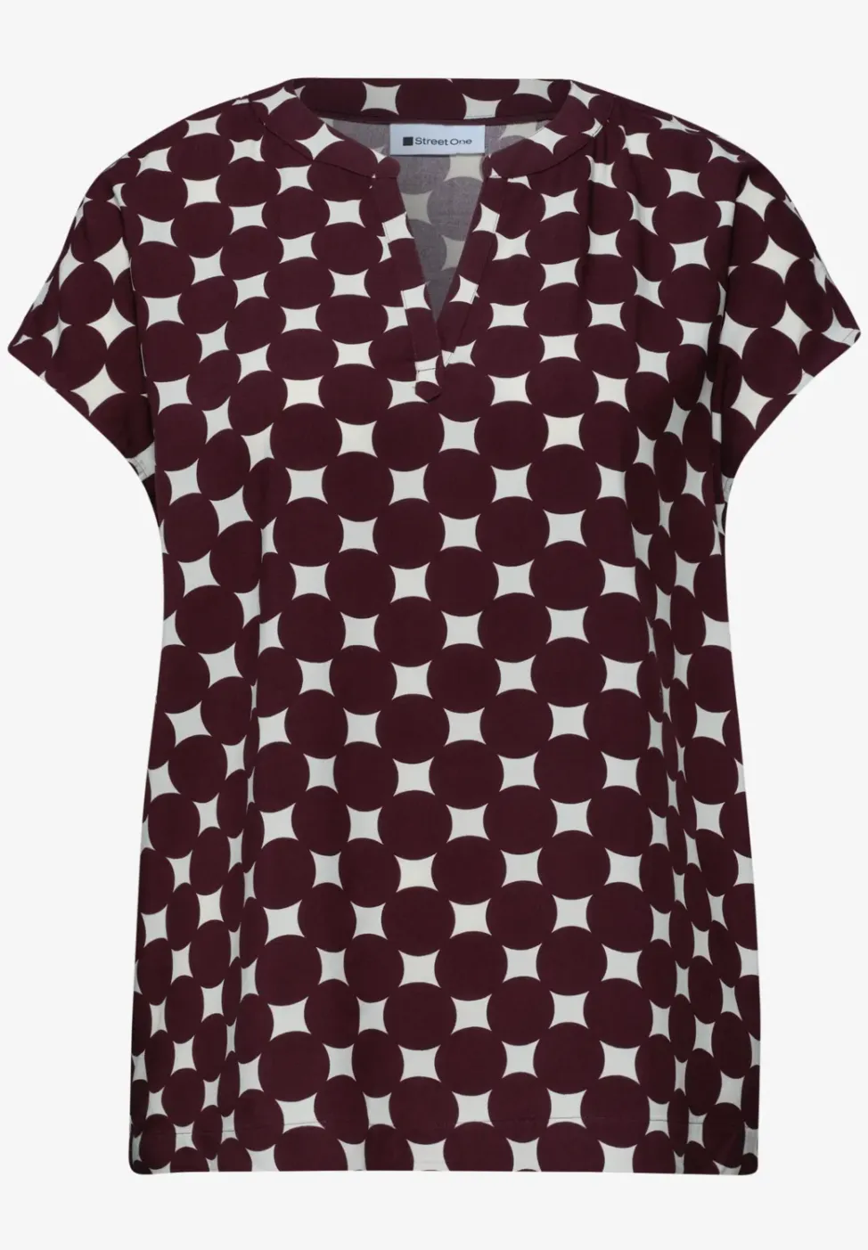 Blouse à épaules tombantes avec col fendu