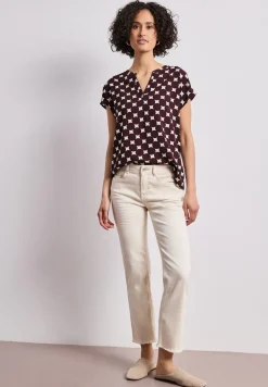 Blouse à épaules tombantes avec col fendu