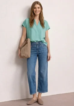 Blouse à épaules tombantes avec col fendu