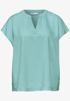 Blouse à épaules tombantes avec col fendu