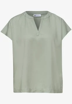Blouse à épaules tombantes avec col fendu