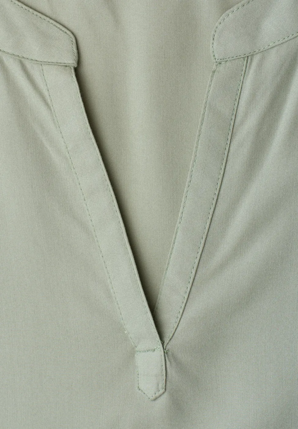 Blouse à épaules tombantes avec col fendu