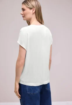 Blouse à épaules tombantes avec col fendu
