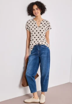 Blouse à épaules tombantes avec col fendu