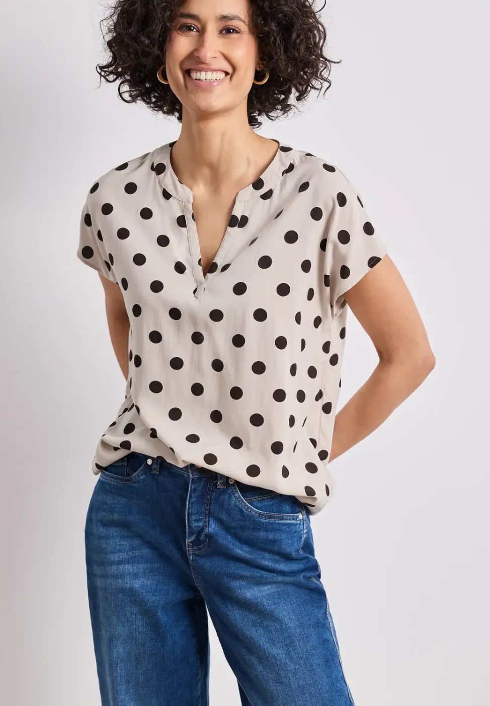 Blouse à épaules tombantes avec col fendu