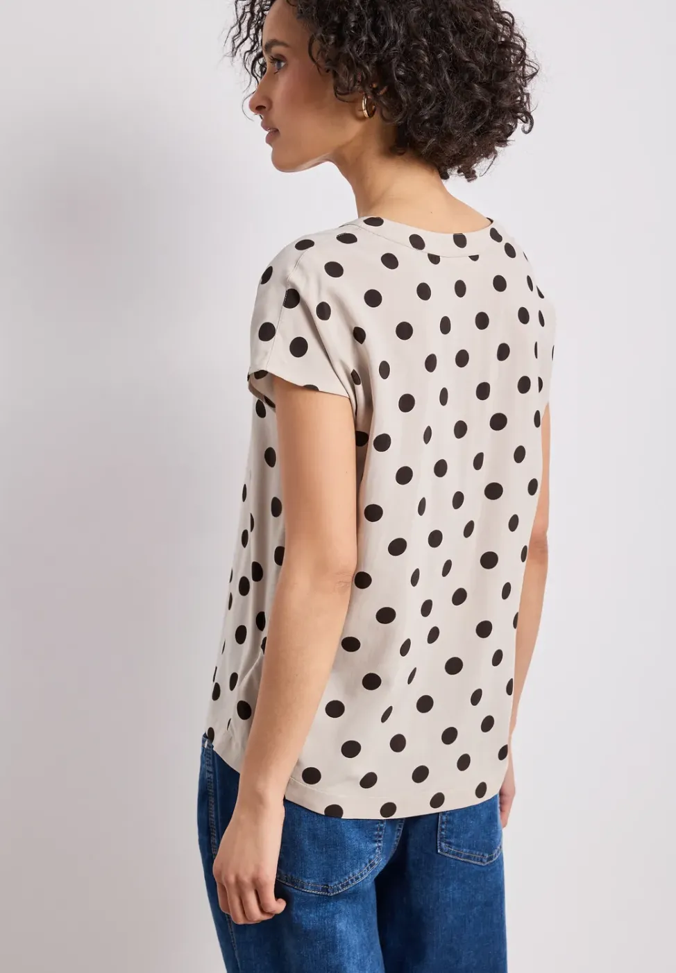 Blouse à épaules tombantes avec col fendu