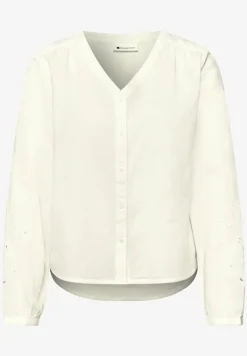 Blouse avec col en V et broderie