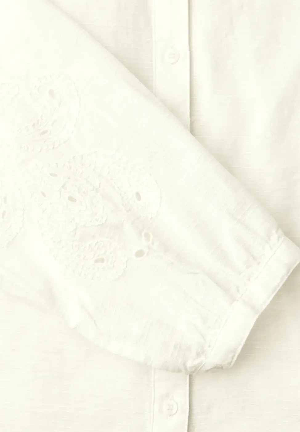 Blouse avec col en V et broderie